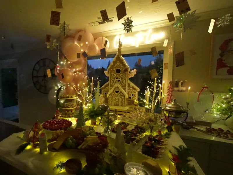 Warmly lit dessert display at a Clayton evening celebration