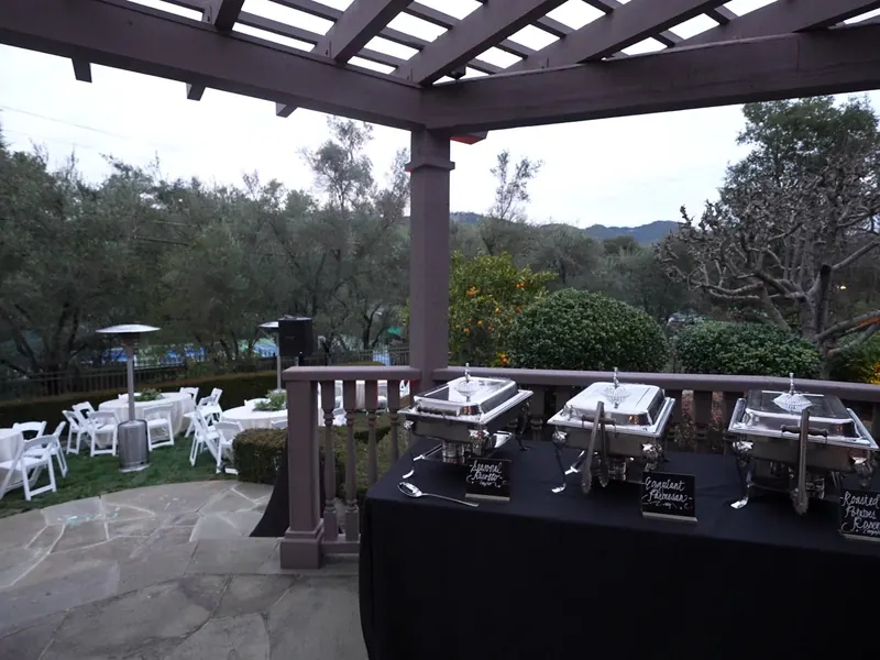 Pergola buffet set with a view over the Moraga valley