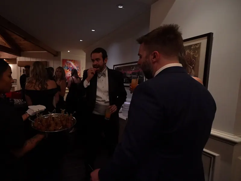 Passed hors d'oeuvres circulating at an indoor Pleasant Hill gathering